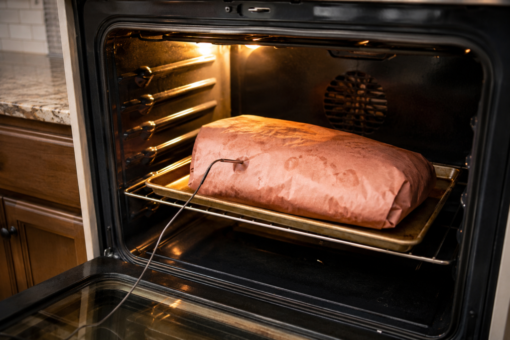 Holding smoked brisket in a low-temperature oven